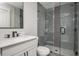 Sleek bathroom featuring tiled shower, modern fixtures, and a stylish vanity at 906 Bingham St, Woodstock, GA 30188