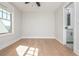 Bright bedroom featuring ensuite bathroom entrance and large windows at 906 Bingham St, Woodstock, GA 30188