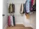 Walk-in closet with wire shelving and wood floors at 906 Bingham St, Woodstock, GA 30188