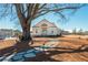 Community center with a tree and landscaped walkway in a community of beautifully designed homes at 906 Bingham St, Woodstock, GA 30188