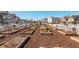 Raised garden beds provide residents a space to cultivate flowers, vegetables, and herbs, fostering a green community at 906 Bingham St, Woodstock, GA 30188