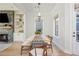 Open-concept layout showcasing the fireplace, dining area, and seamless transition to the outdoor space at 906 Bingham St, Woodstock, GA 30188