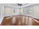 Spacious bedroom with tray ceilings, hardwood floors, recessed lighting, and French doors to the backyard at 1764 Springview Nw Rd, Atlanta, GA 30314