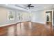 Bedroom with hardwood floors, tray ceilings, recessed lighting, and views to the backyard at 1764 Springview Nw Rd, Atlanta, GA 30314