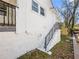 Exterior side view showing painted brick, stairs, and landscaping at 1764 Springview Nw Rd, Atlanta, GA 30314