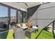 Relaxing outdoor balcony features comfortable seating and pleasant neighborhood views at 223 16Th Nw St # 2, Atlanta, GA 30363