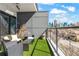 Stylish balcony seating with stunning city skyline views, perfect for urban living and outdoor relaxation at 223 16Th Nw St # 2, Atlanta, GA 30363