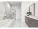 Modern bathroom featuring a luxurious soaking tub and glass enclosed shower at 223 16Th Nw St # 2, Atlanta, GA 30363