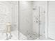 Elegant bathroom featuring a glass shower, marble tile, and modern fixtures at 223 16Th Nw St # 2, Atlanta, GA 30363