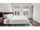 Bright bedroom with large windows and hardwood floors at 223 16Th Nw St # 2, Atlanta, GA 30363