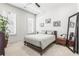 Well-lit bedroom with a large mirror and a comfortable bed at 223 16Th Nw St # 2, Atlanta, GA 30363