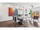 Open dining area with modern lighting fixture that connects to the living room at 223 16Th Nw St # 2, Atlanta, GA 30363