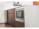 A modern kitchen is complemented with a built-in microwave and stainless steel appliances at 223 16Th Nw St # 2, Atlanta, GA 30363