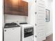 Efficient laundry room with modern washer and dryer units and ample storage at 223 16Th Nw St # 2, Atlanta, GA 30363