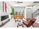 Comfortable living room featuring modern decor, fireplace, and access to a private outdoor balcony at 223 16Th Nw St # 2, Atlanta, GA 30363
