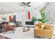 Bright living room features a modern fireplace, hardwood floors, and stylish furniture at 223 16Th Nw St # 2, Atlanta, GA 30363