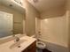 Bathroom with tub and shower combo plus a single sink vanity at 2643 Winslow Ridge Dr, Buford, GA 30519