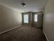 Bedroom with carpeted floors, natural light, and a closet at 2643 Winslow Ridge Dr, Buford, GA 30519