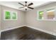 Bedroom featuring a dark hardwood floor and natural light at 2682 Miriam Lane Ln, Decatur, GA 30032