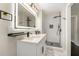 Bathroom featuring a double vanity, subway tiled shower, and modern finishes at 2682 Miriam Ln, Decatur, GA 30032