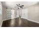 Spacious main bedroom with hardwood floors, closet, barn door to the ensuite at 2682 Miriam Ln, Decatur, GA 30032