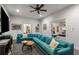 Spacious living room featuring a large sectional sofa, recessed lighting, and an open doorway to an exercise room at 2871 Parkridge Ne Dr, Brookhaven, GA 30319