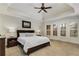 Serene main bedroom suite featuring tray ceilings, large windows, and ample space at 2871 Parkridge Ne Dr, Brookhaven, GA 30319