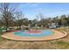 Colorful splash pad with multiple water features offers a refreshing and interactive play experience for on sunny days at 2871 Parkridge Ne Dr, Brookhaven, GA 30319