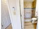 Modern bathroom featuring tile flooring, a walk-in shower with grab bars, and neutral-toned walls at 300 Johnson Ferry Ne Rd # B103-105, Atlanta, GA 30328