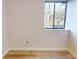 Bedroom showcasing wood flooring, natural light from a window, and neutral walls for versatile decor options at 300 Johnson Ferry Ne Rd # B103, Atlanta, GA 30328