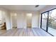 Bedroom featuring walk-in closets and access to a balcony at 300 Johnson Ferry Ne Rd # B103, Atlanta, GA 30328