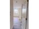 Entryway with view of bedroom with natural light, and wood flooring at 300 Johnson Ferry Ne Rd # B103-105, Atlanta, GA 30328