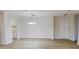 Open living room with a chandelier and new floors at 300 Johnson Ferry Ne Rd # B103, Atlanta, GA 30328