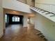 Open foyer with detailed mouldings, beautiful wood floors and modern lighting fixtures shows off the spacious floor plan at 1366 Wessyngton Ne Rd, Atlanta, GA 30306