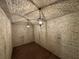 Unique wine cellar with brick ceiling and walls, highlighted by stylish hanging lights at 1366 Wessyngton Ne Rd, Atlanta, GA 30306