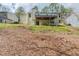 View of backyard with patio; awaiting personalization at 1492 Cobb Branch Dr, Decatur, GA 30032