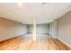 Unfinished basement featuring wood floors, high ceilings and block walls at 1492 Cobb Branch Dr, Decatur, GA 30032