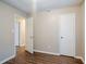 Neutral bedroom featuring wood floors, white trim and a closet at 1492 Cobb Branch Dr, Decatur, GA 30032