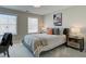 Cozy bedroom features a comfortable bed, nightstands, and natural light at 4541 Moray Dr, Mableton, GA 30126