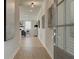 Inviting hallway with modern décor leading to a living area with natural light and views at 4541 Moray Dr, Mableton, GA 30126