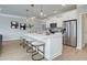 Bright kitchen boasts an island with seating and modern stainless steel appliances at 4541 Moray Dr, Mableton, GA 30126