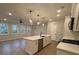 Modern kitchen features an island with seating and plenty of natural light at 4541 Moray Dr, Mableton, GA 30126