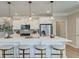 Bright kitchen boasts an island with seating and modern stainless steel appliances at 4541 Moray Dr, Mableton, GA 30126