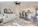 Spacious living room features modern decor, open layout, and kitchen access at 4541 Moray Dr, Mableton, GA 30126