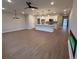 Bright open living room/kitchen features a fireplace at 4541 Moray Dr, Mableton, GA 30126