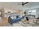 Open-concept living space featuring a modern kitchen, living room, and stylish decor at 4541 Moray Dr, Mableton, GA 30126