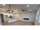 Bright open living room/kitchen features a fireplace at 4541 Moray Dr, Mableton, GA 30126