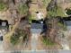 Overhead view of the property, showcasing the house, yard, driveway, and surrounding neighborhood at 70 Nw Willow Bend Dr, Cartersville, GA 30121