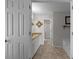 Well-lit bathroom featuring a granite countertop and a separate shower room at 70 Nw Willow Bend Dr, Cartersville, GA 30121