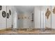 Granite countertop with double sinks with decorative mirrors on the wall at 70 Nw Willow Bend Dr, Cartersville, GA 30121